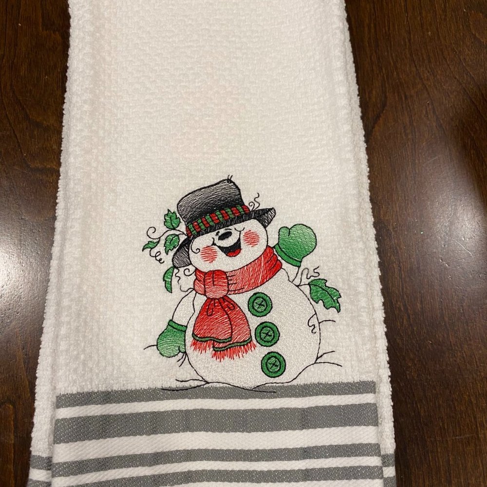 Machine embroidery: shirts,towels,baby items,dish towels, back packs, wall art